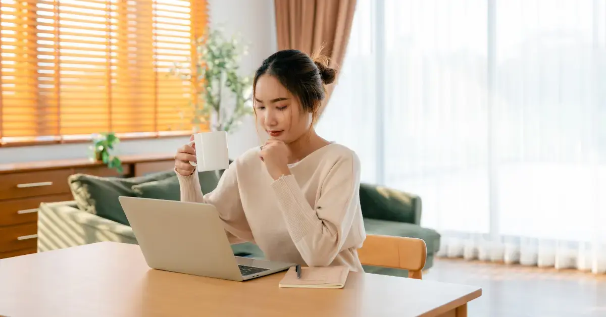 Female creator checking deadlines related to BOI filing deadline extension and tax obligations.