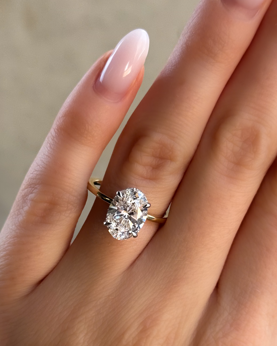 GOODSTONE Thin + Simple Solitaire Engagement Ring With Oval Cut Diamond