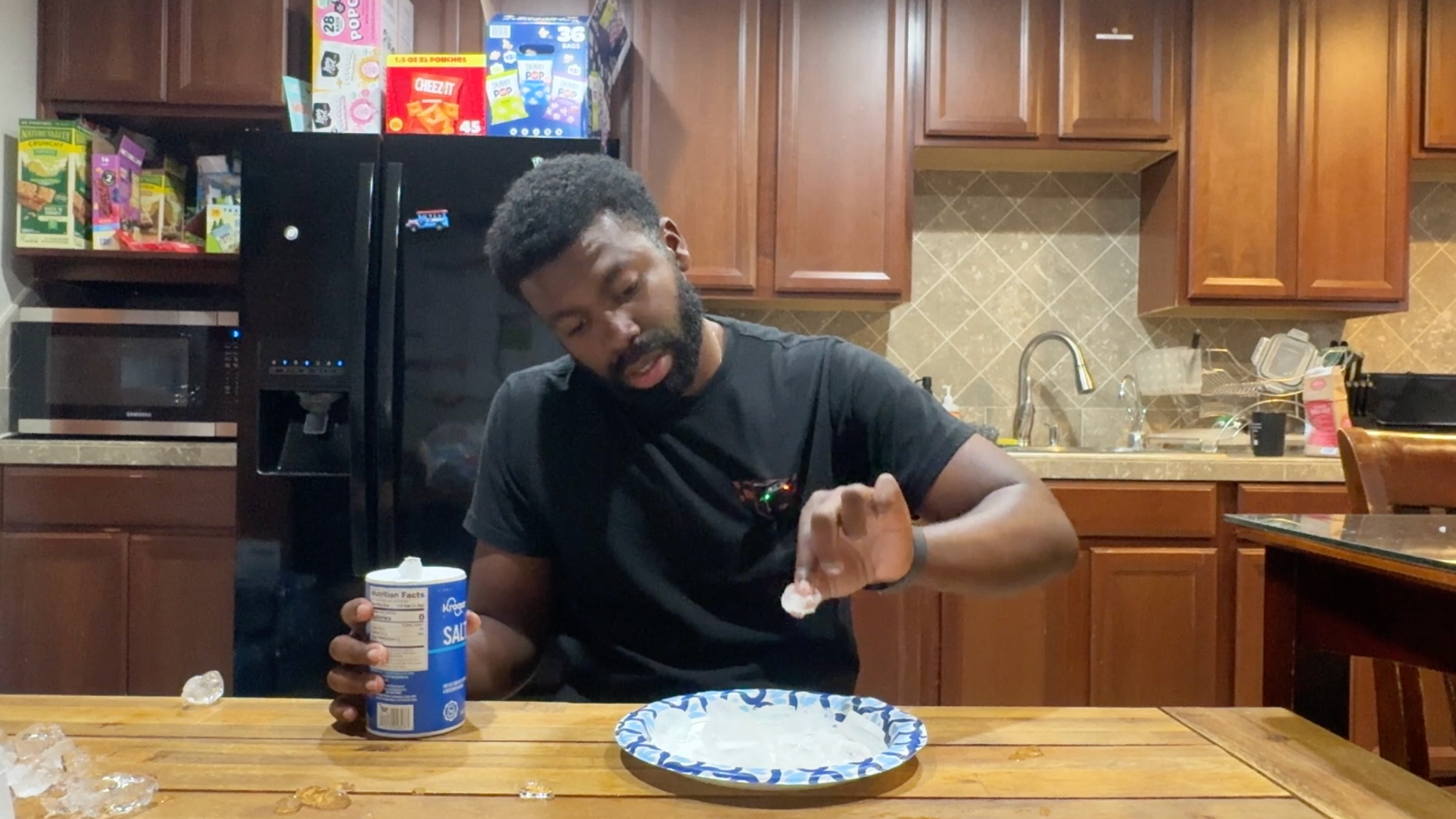 putting salt on ice cubes