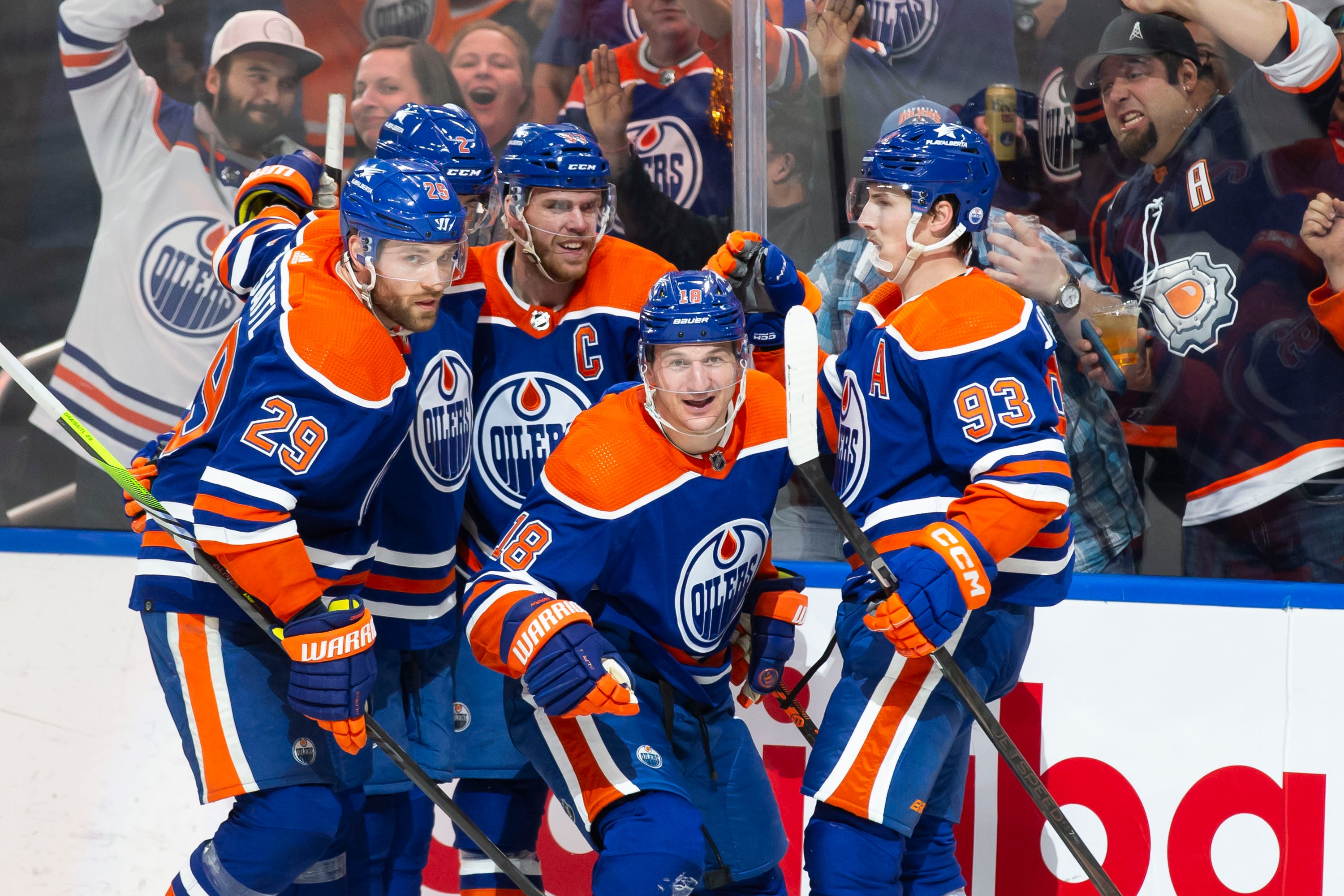 Leon Draisaitl, Evan Bouchard, Connor McDavid, Zach Hyman and Ryan Nugent-Hopkins of the Edmonton Oilers celebrate Hyman's goal against the Los Angeles Kings during the First Round of the 2024 Stanley Cup Playoffs at Rogers Place on April 24, 2024, in Edmonton, Canada.