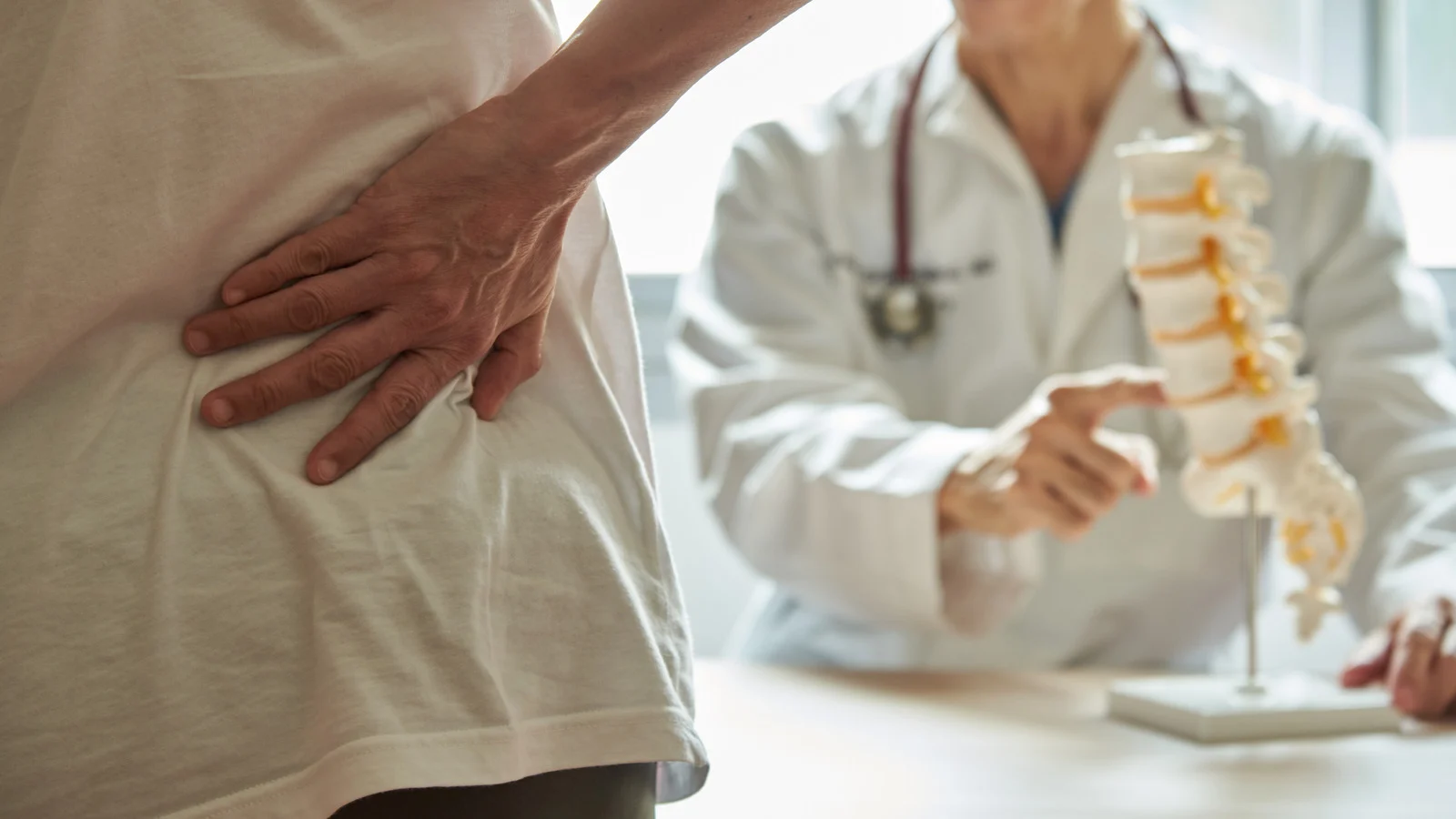 doctor explaining lumbar spinal stenosis