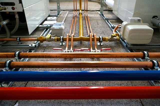 Multicolored water pipes to illustrate commercial services.
