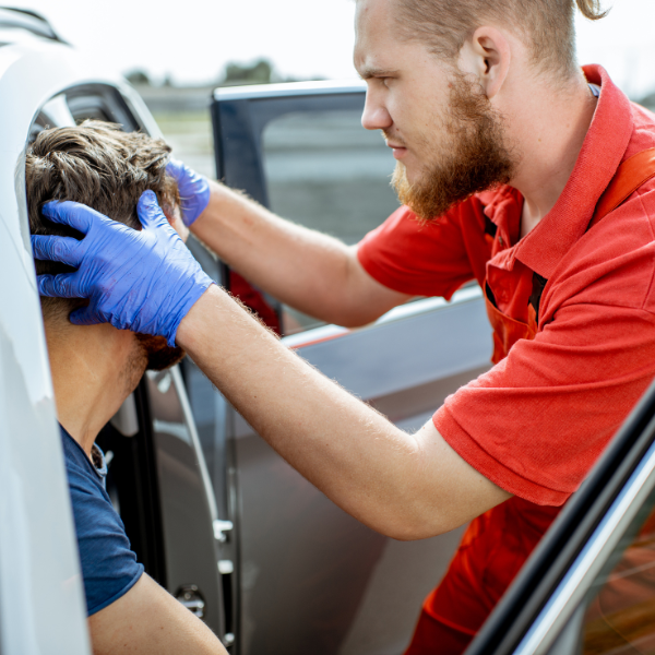 Image showing a person getting a medical evaluation for physical injuries from a truck accident.