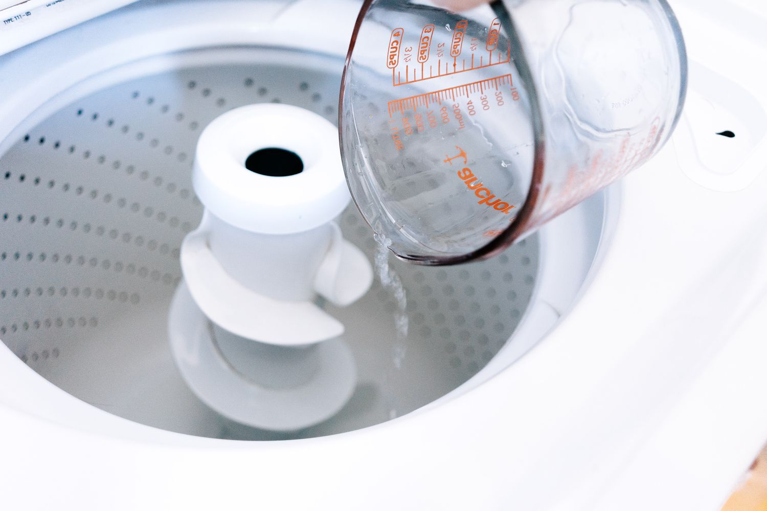 How to Clean and Sanitize Your Washing Machine Inside and Out - Dengarden