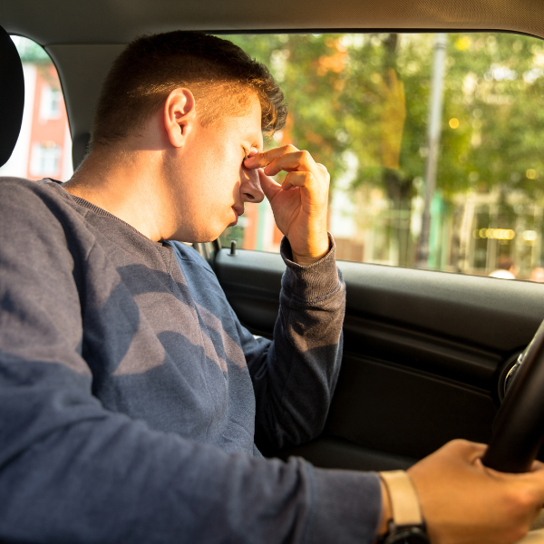 Image showing a stressed driver after a car accident in Duluth, GA.