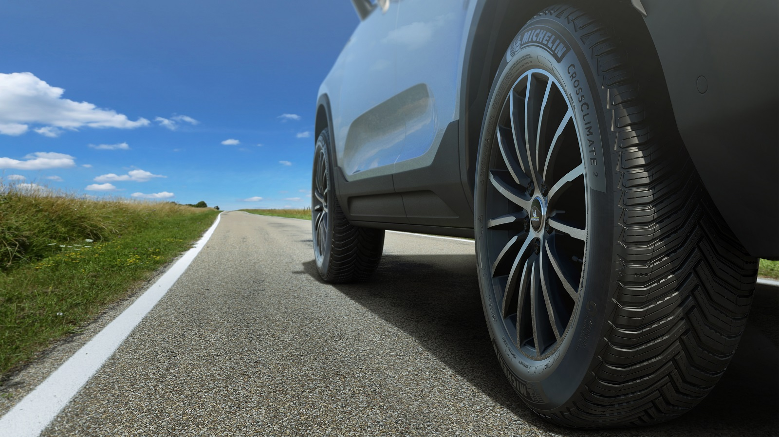 Vehicle tire driving on asphalt