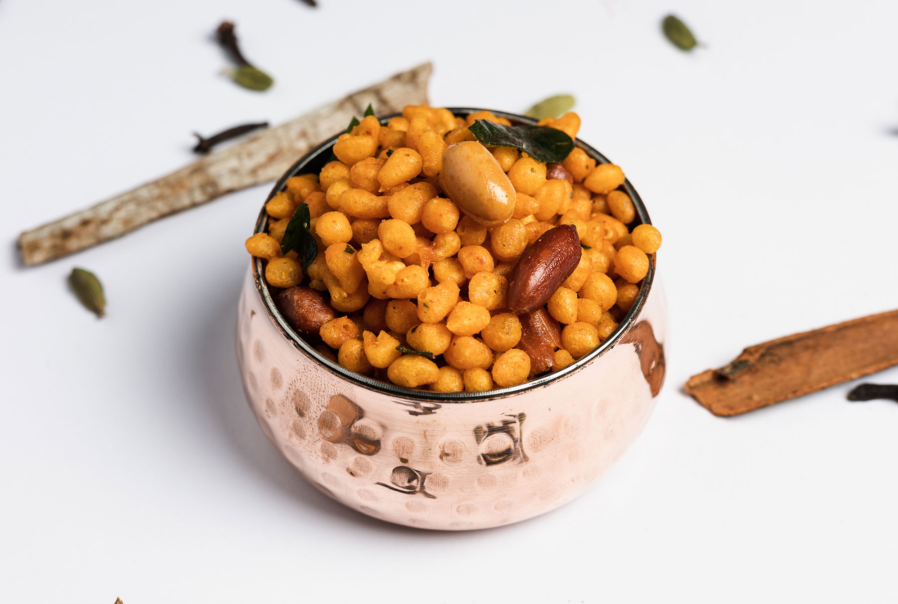 Boondi Mixture: Crispy blend of fried boondi, nuts, and spices, a delicious Indian snack