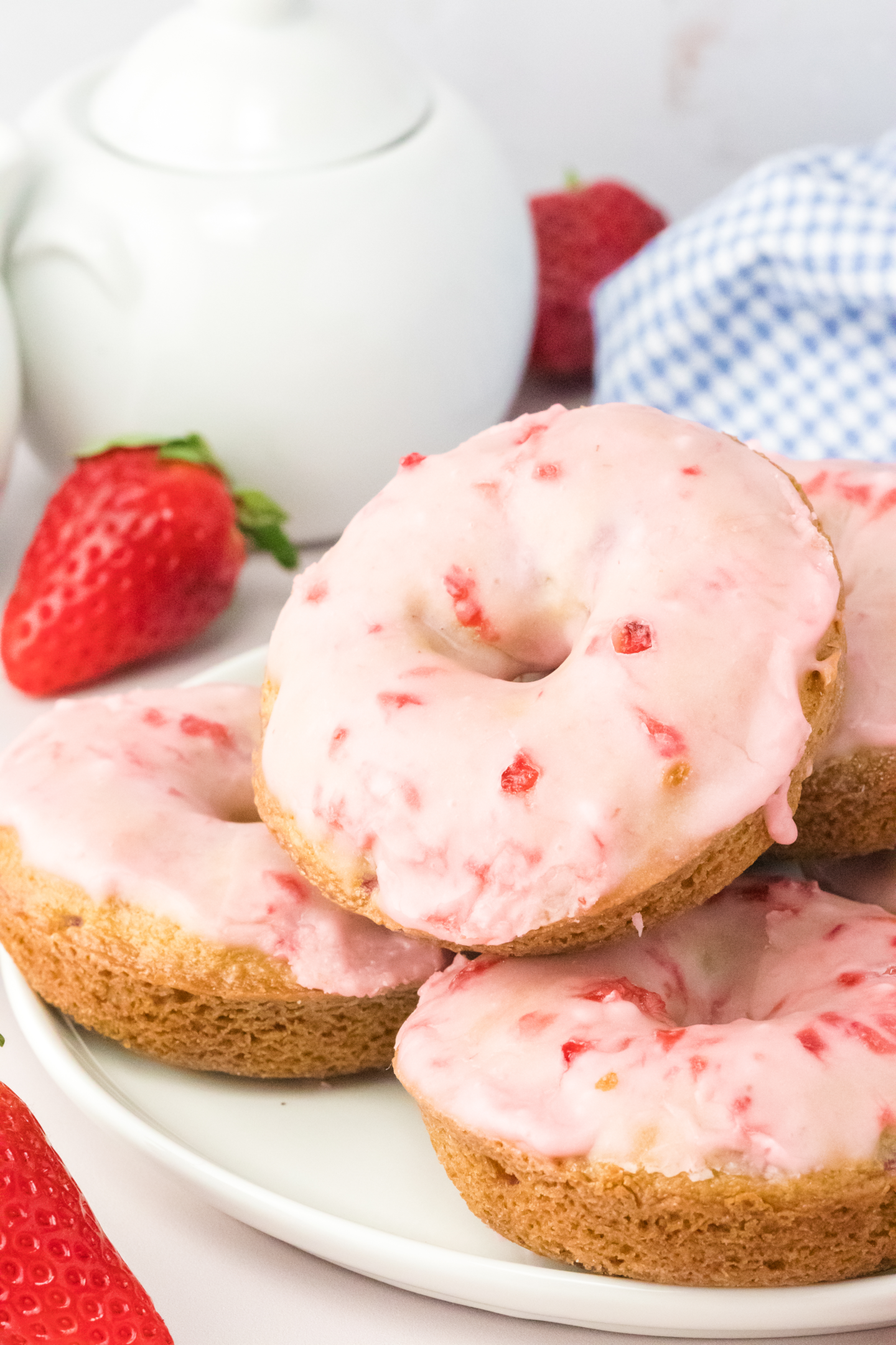 baked strawberry donuts on a plate