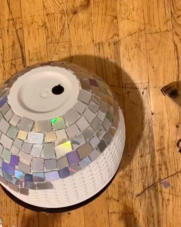 Disco ball decor for all occassions. Disco planter from old CDs. Maybe make dresses out of the same.