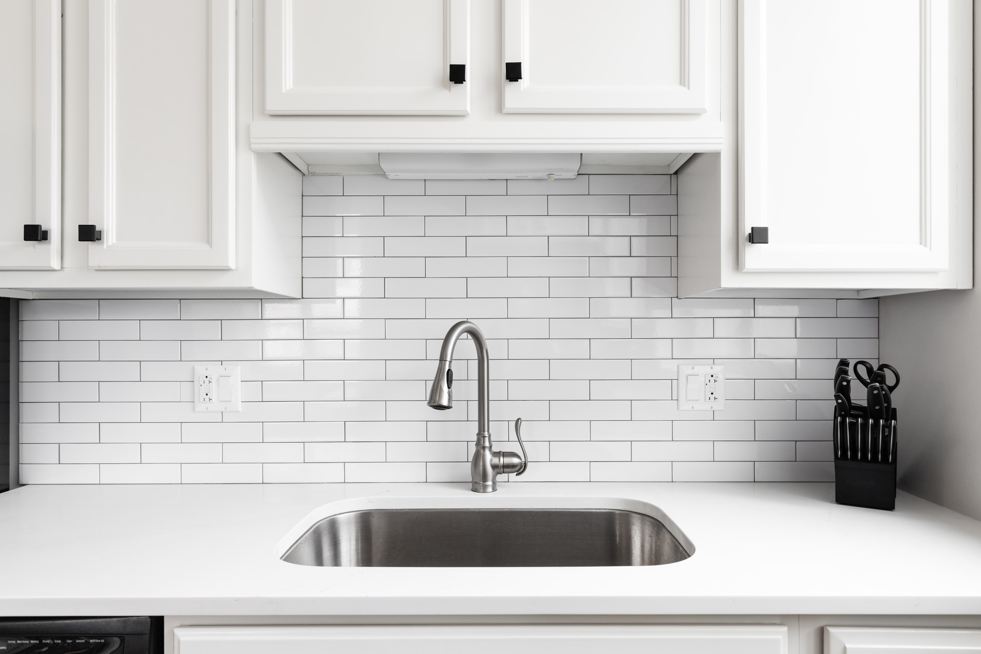 White replacement doors in modern kitchen
