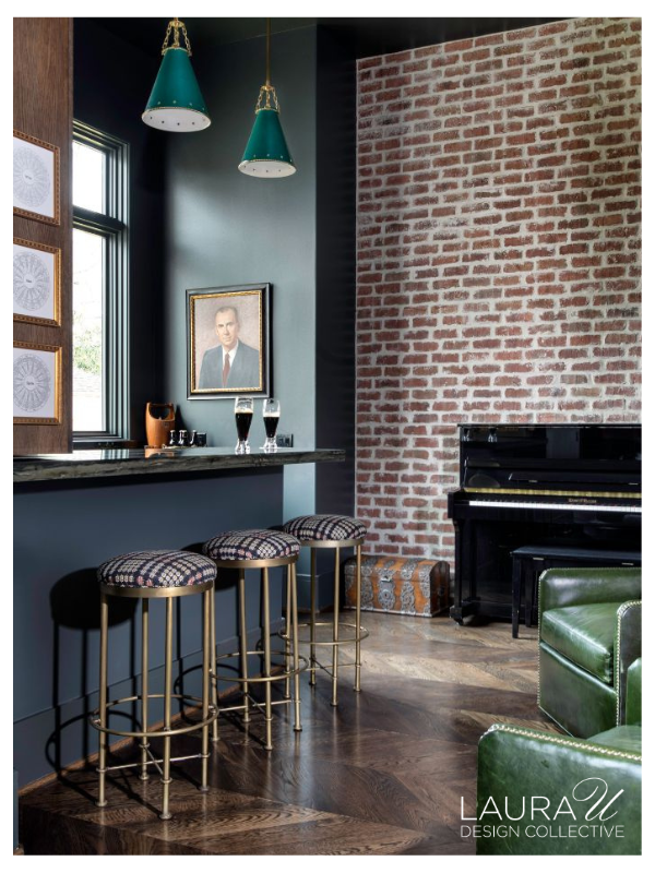 Traditional pub-inspired home bar with painted millwork, exposed brick, and brass accents at Dumbarton.