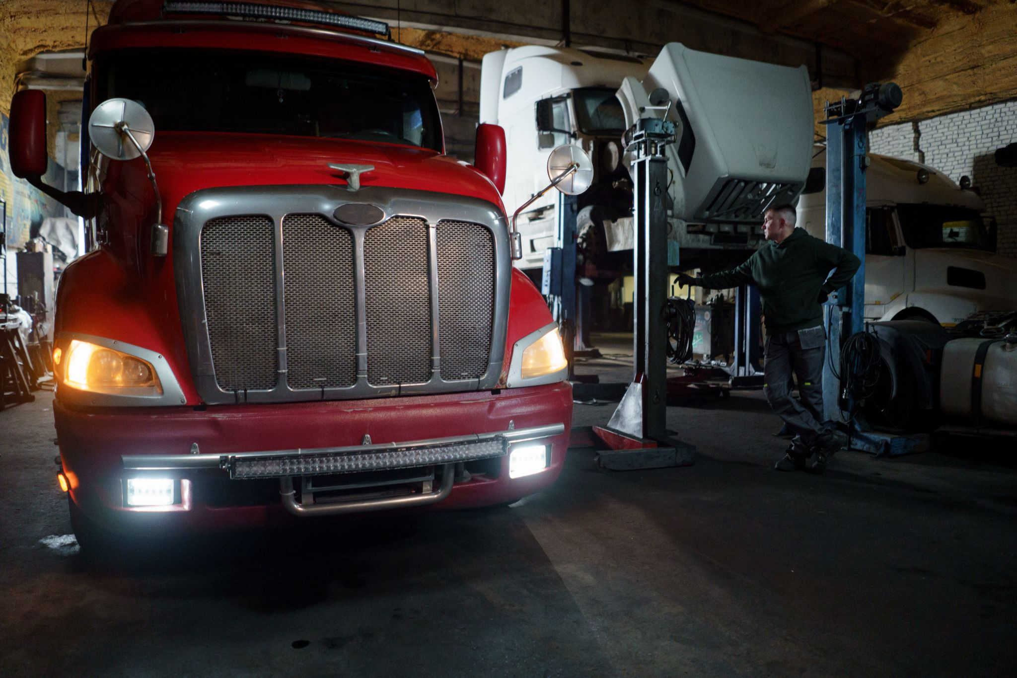 Repair shop with trucks on deck