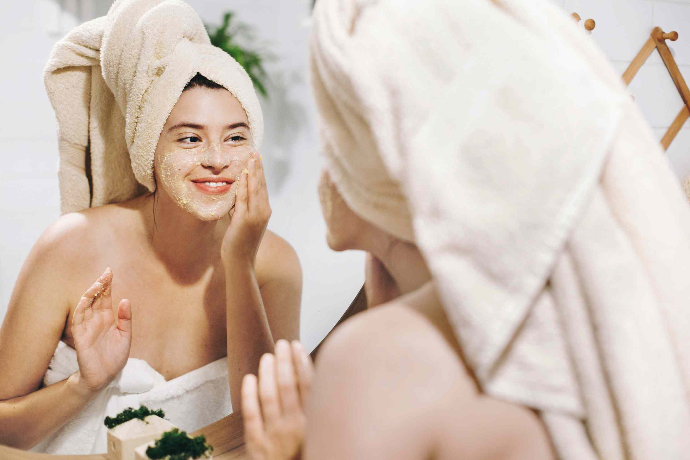 A woman applying additional tips to prevent acne