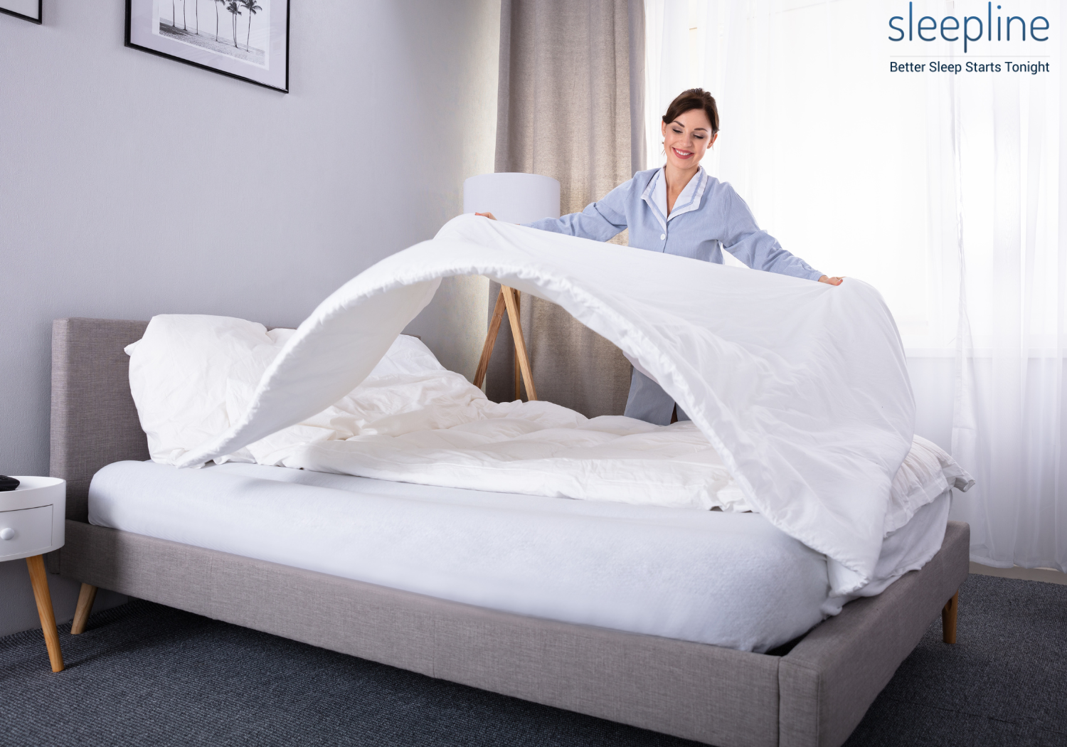 Adding fresh bedding to a newly cleaned mattress