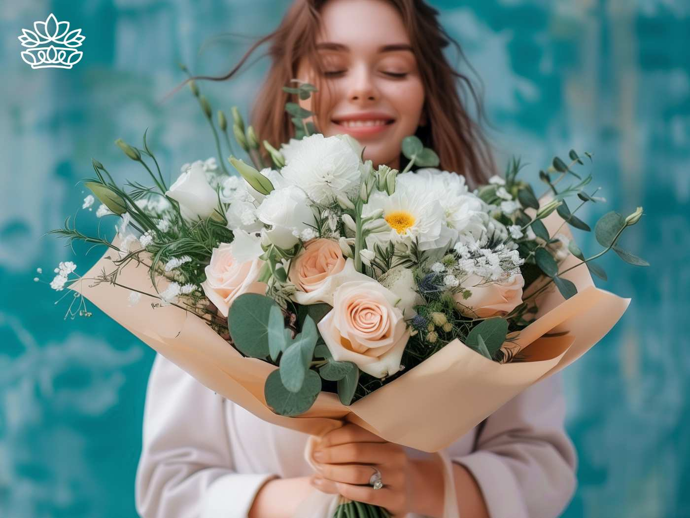 Delighted woman embracing a bouquet of fresh flowers, showcasing the reliable services that create and support family moments, offered by the Cape Town Gift Delivery Collection with options including wine, for customers who value quality, from the Fabulous Flowers and Gifts website.