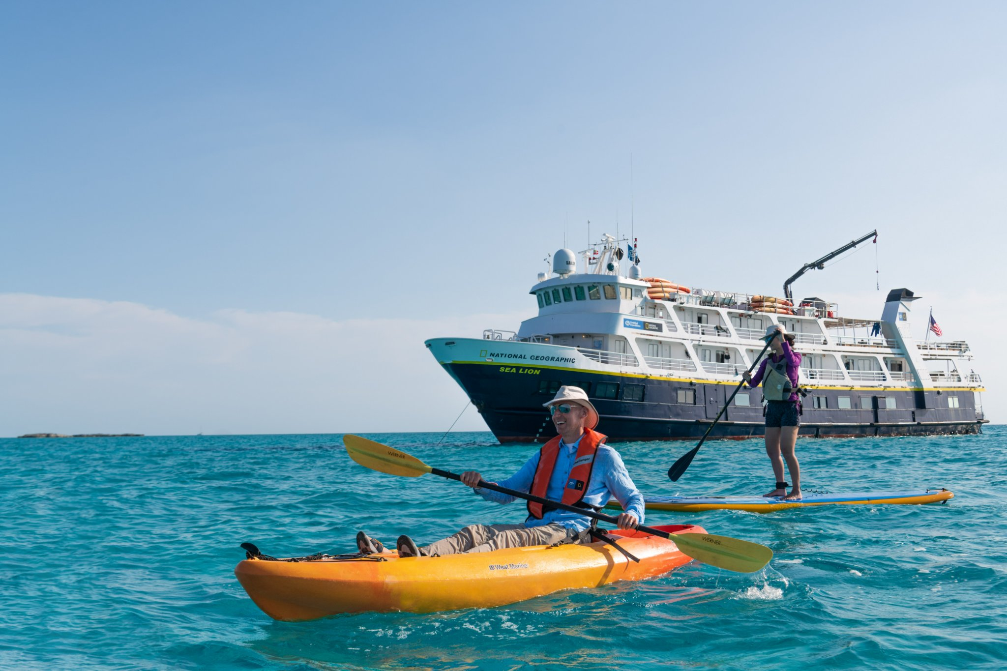 stand up paddle board and a kayak