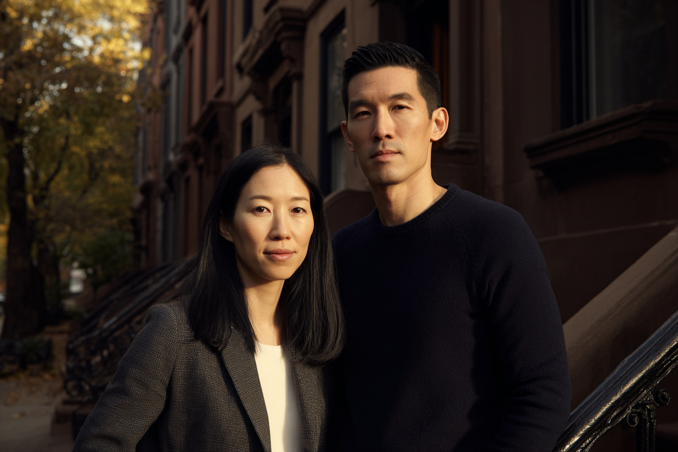 Asian American couple in Brooklyn Heights doing online Gottman Method Couples Therapy with Travis Atkinson, a Certified Gottman Method Couples Therapist.