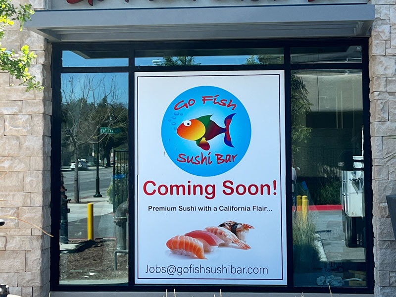 Go Fish Sushi Bar – “Coming Soon” window graphic announcing the new restaurant.