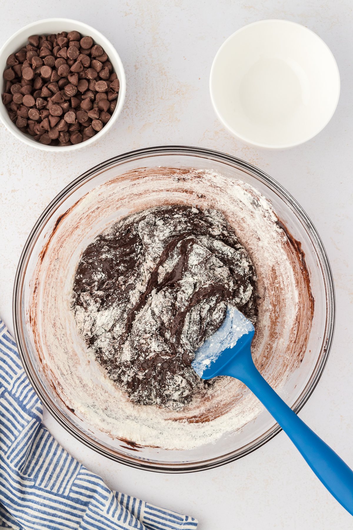 flour stirred into cocoa brownie batter