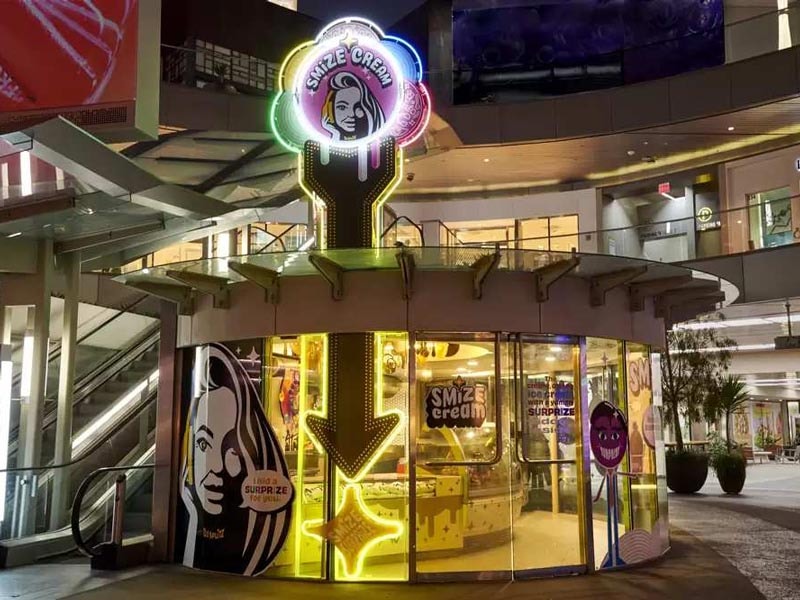 Smize Cream neon sign in Santa Monica, CA at night by Dave's Signs.
