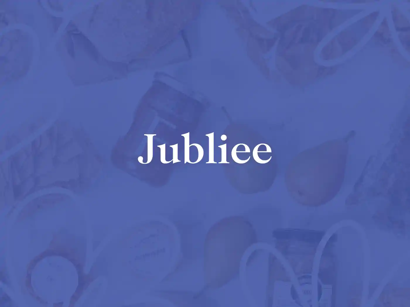  A vibrant display of assorted gourmet foods with "Jubilee" text overlay, representing the "Jubilee" collection by Fabulous Flowers and Gifts.