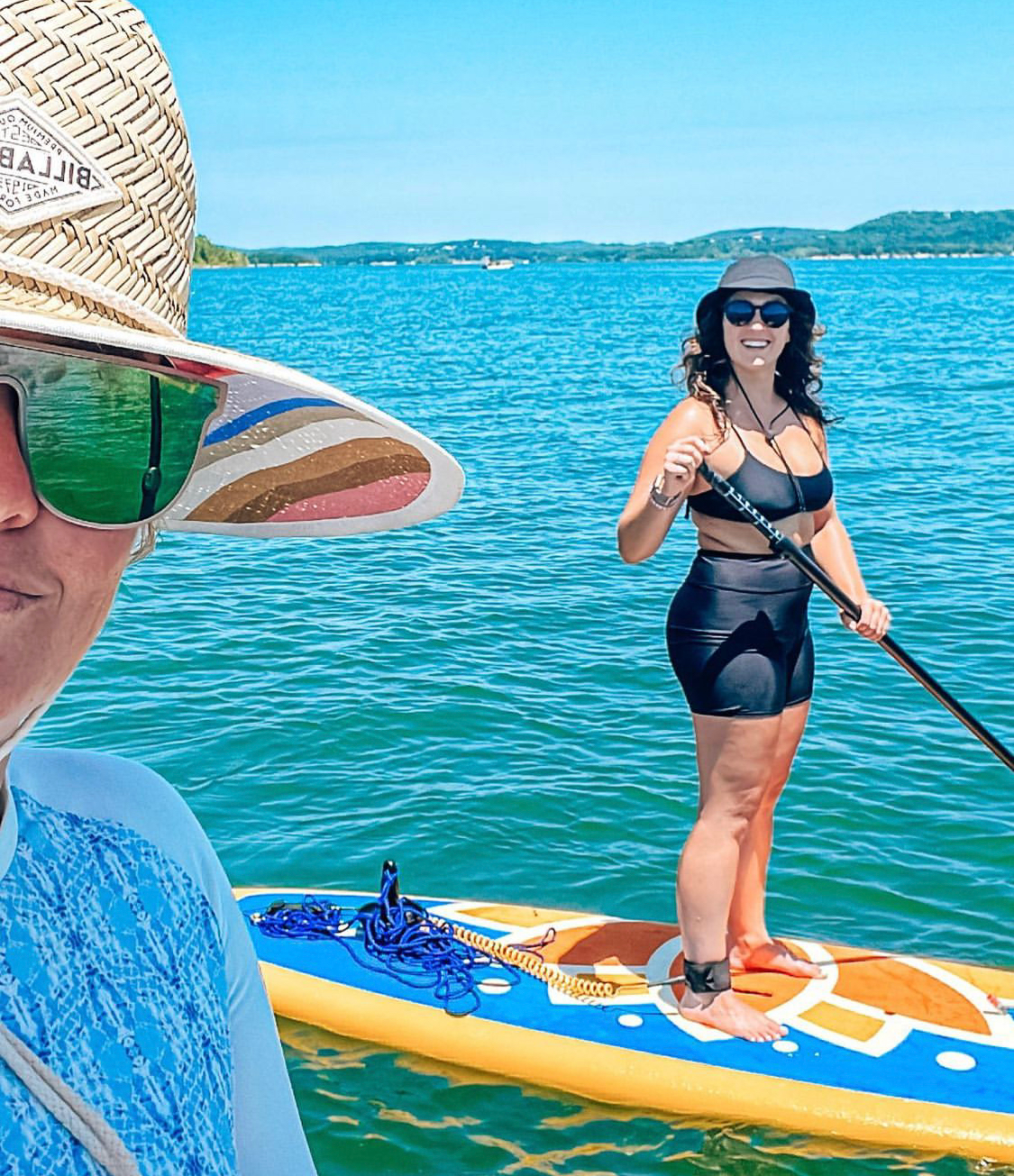 woman on a stand up paddle board