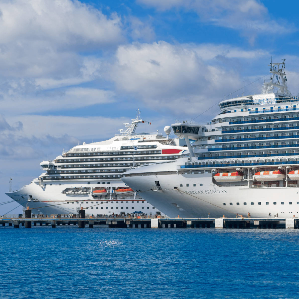 two carnival cruises at port