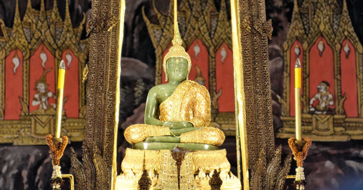 The Sacred Emerald Buddha at The Temple of the Emerald Buddha in Bangkok, Thailand.