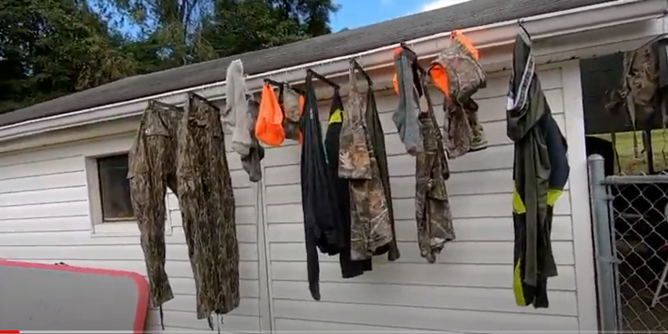 hunting clothes hanged on wall