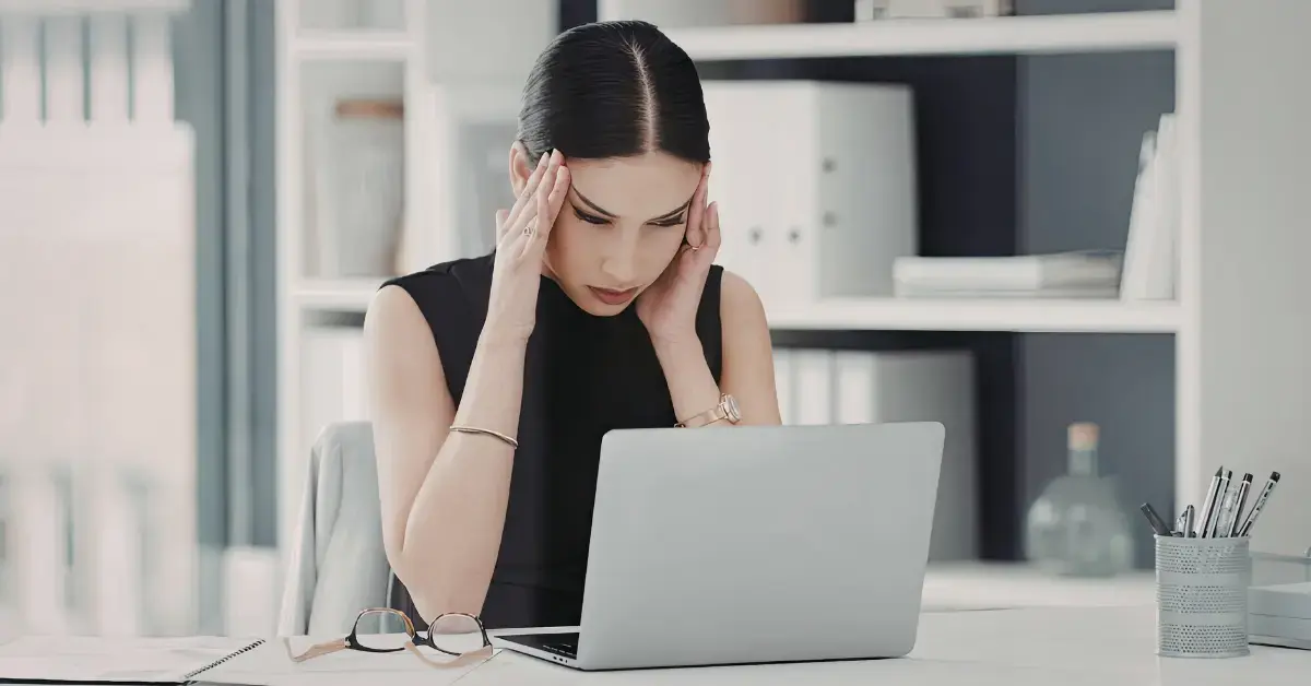Woman experiencing IRS payment plan submission error while applying online payment plan on laptop.