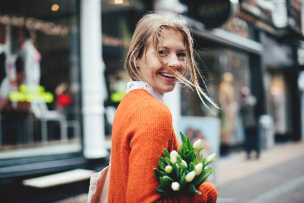 Dutch woman holding flowers