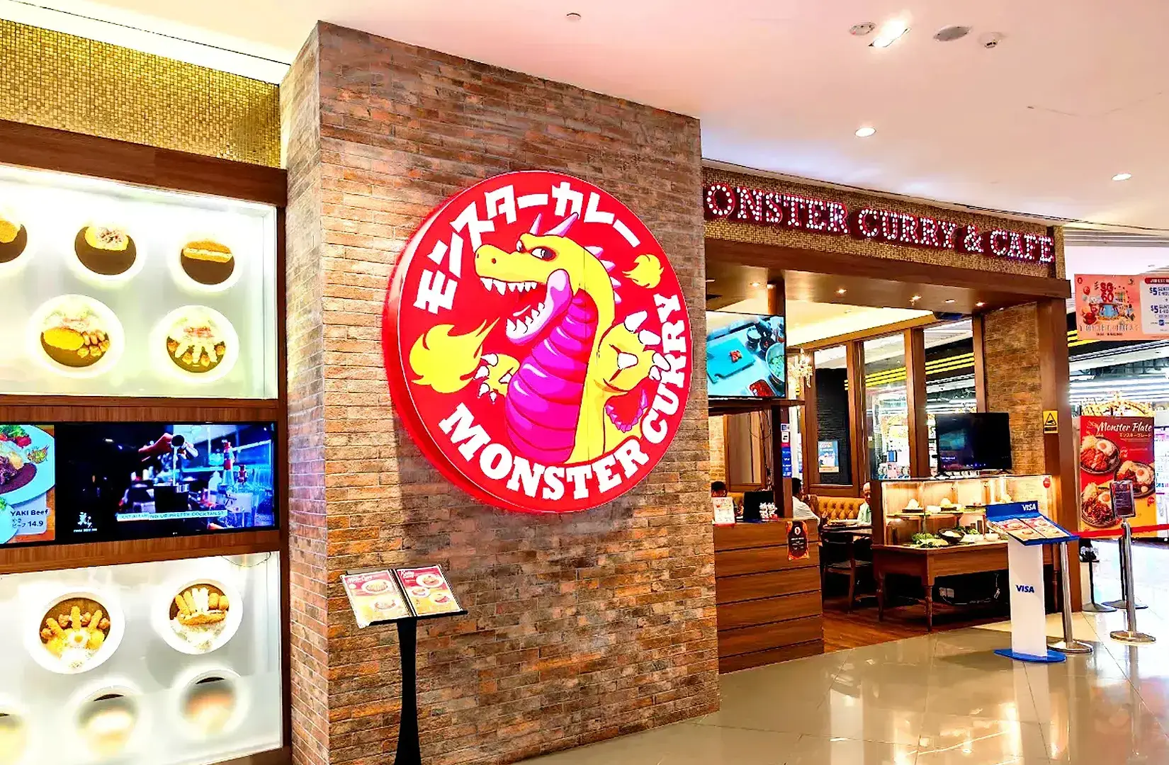 Monster Curry Singapore restaurant entrance with signature dragon logo and Japanese curry branding