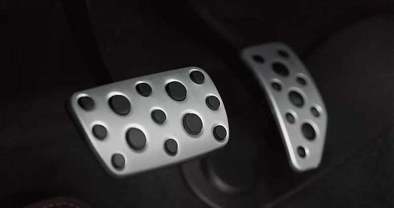 Close-up of Subaru's sport pedals, available in select models at AutoFair Subaru of Haverhill, MA, offering enhanced driving control and a stylish design.