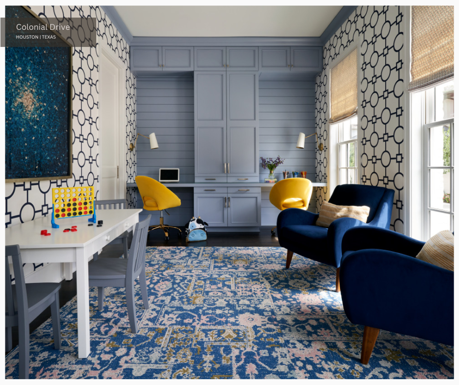 a blue, yellow, black, and white homework room with two large windows