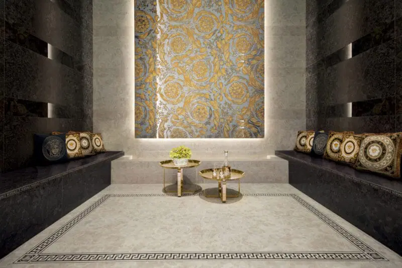When you choose tiles for your countertop, it’s important to balance both the functionality and the look — whether that means avoiding smaller tiles with busy grout lines or opting for glossy finishes that brighten the space. Image: Versace collection by Gardenia Orchidea at EMC Tiles