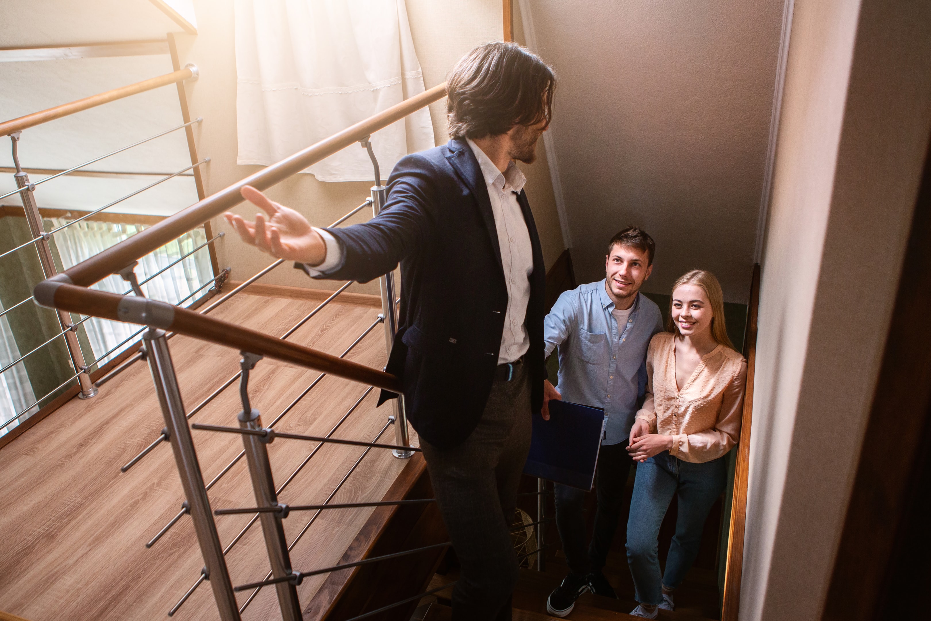 Real estate agent showing prospective buyers around property, maroochydore, maroochydore