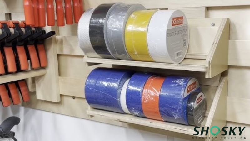 Various quantity of color-coded security tapes stored on shelves, demonstrating effective tape organization
