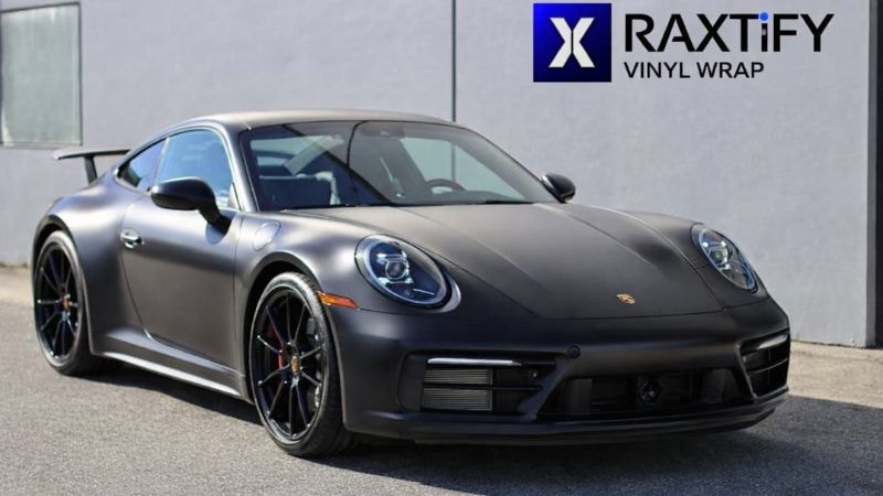 A car wrapped in matte black wrap by RAXTiFY