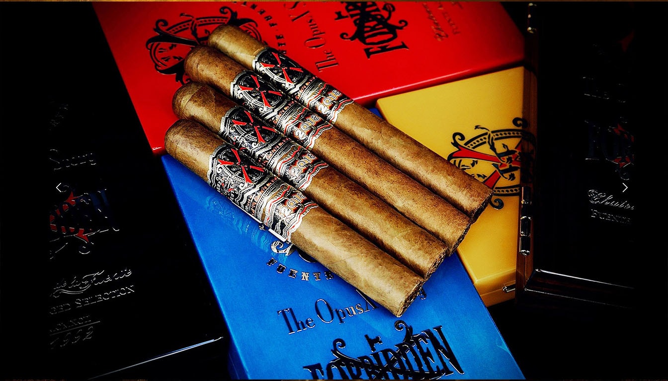 A beautifully arranged sampler box of Arturo Fuente Forbidden X cigars.