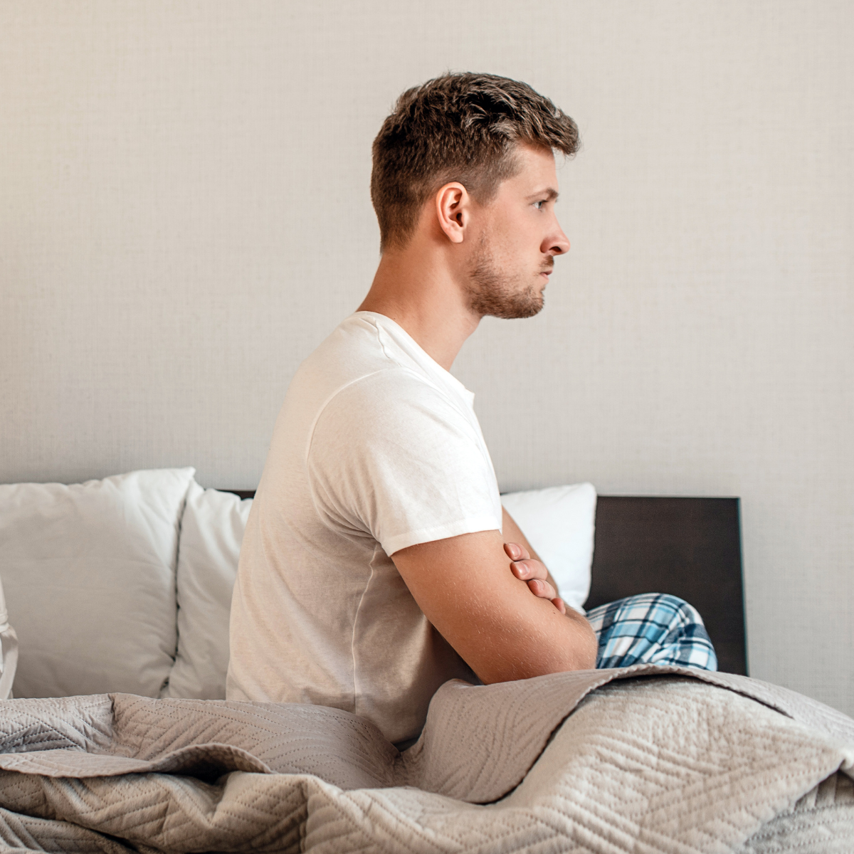 Angry man in bed - constant anger and aggravation is a walking red flag