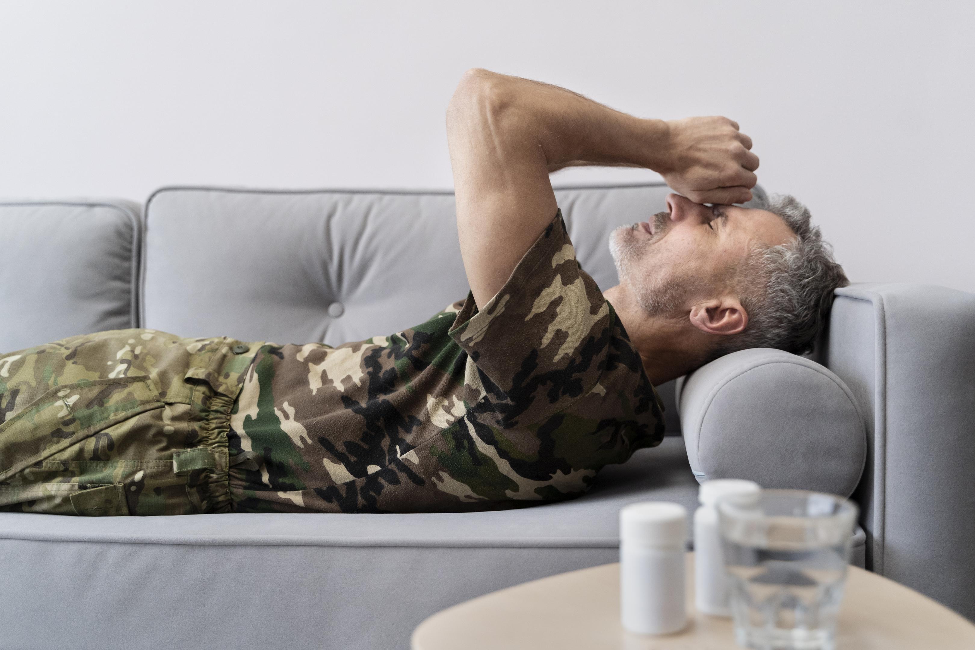 a military man trying to sleep using the military sleep method