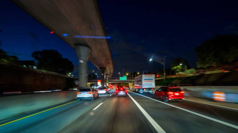 Headlights of a cars at night on road. 