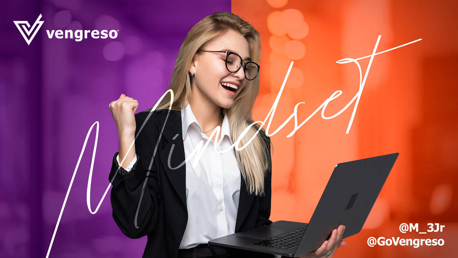 woman with glasses smiling at her laptop with the word Mindset over her