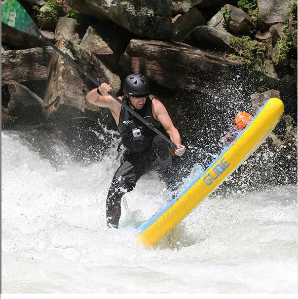 inflatable paddle board on river