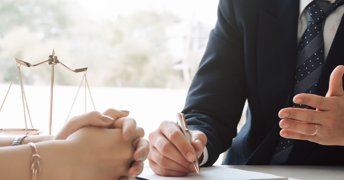 Image of a bankruptcy attorney assisting a client during the discharge process.