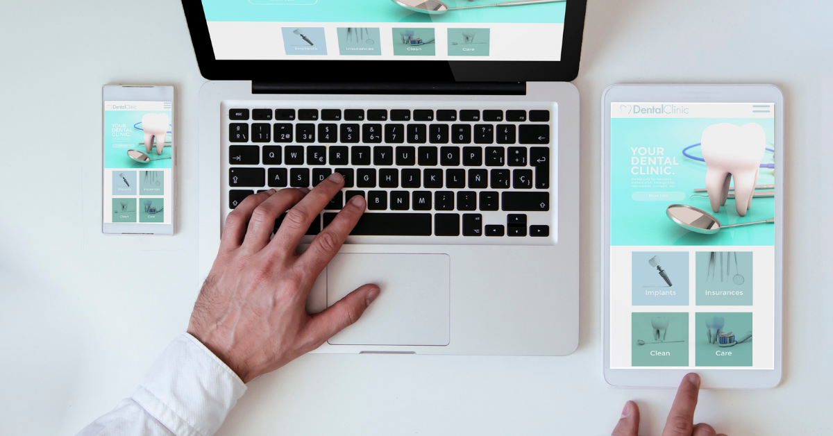 A web developer on their laptop, phone, and tablet editing a mobile-responsive website.