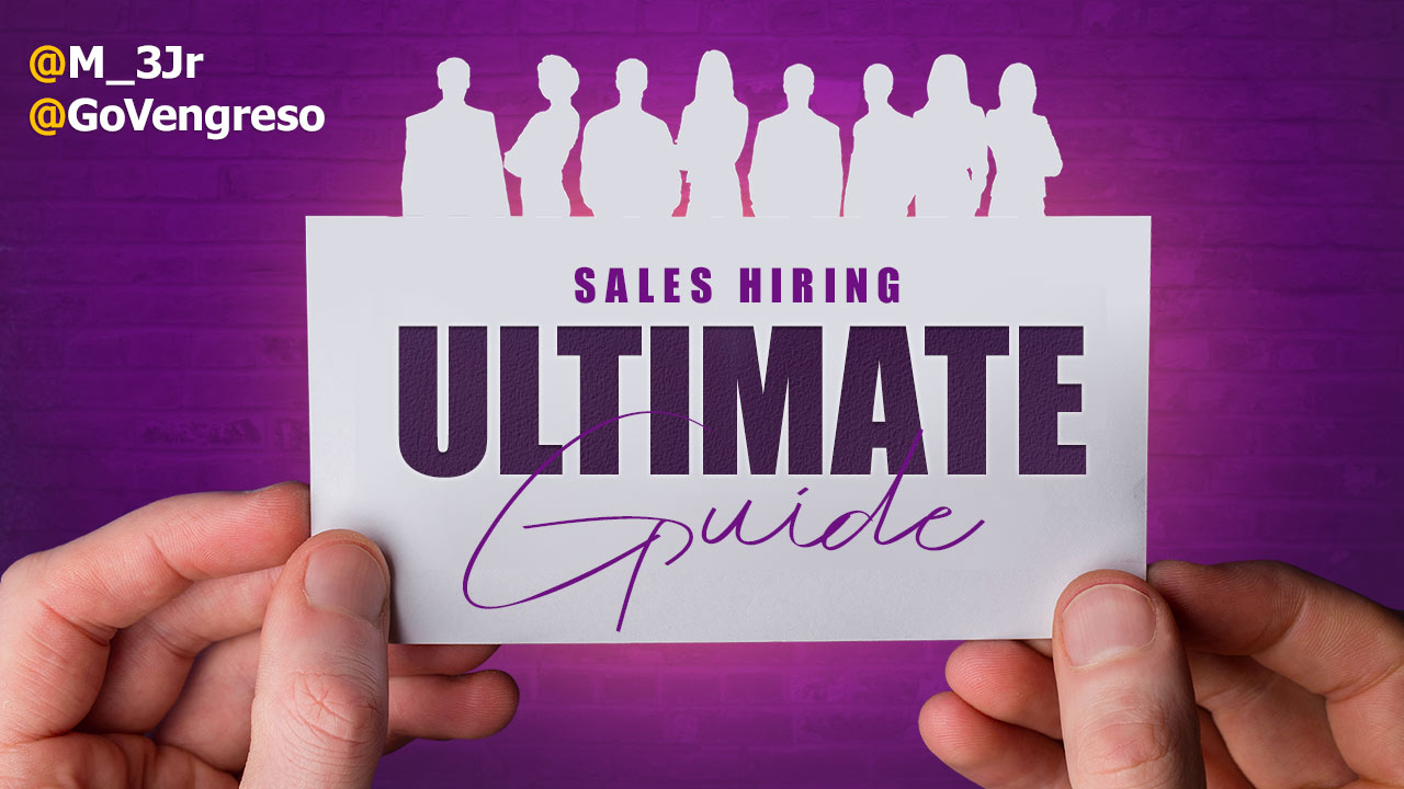 a closeup of two hands holding a paper with the top cut out to look like a silhouette of business people and the words Sales hiring ultimate guide on it