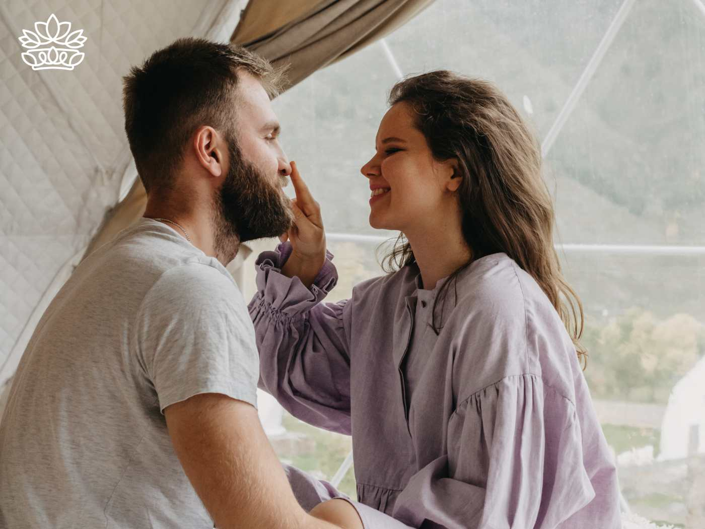 A woman playfully touching her husband's nose, representing the Gift Boxes for Husband Collection - Gift ideas for husband and his favorite gift - Fabulous Flowers and Gifts