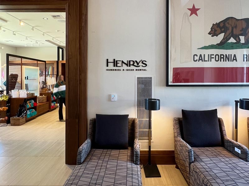 Custom dimensional letters for Henry’s Sundries & Gear Rental provide clear wayfinding while blending seamlessly with the hotel’s coastal-modern design.
