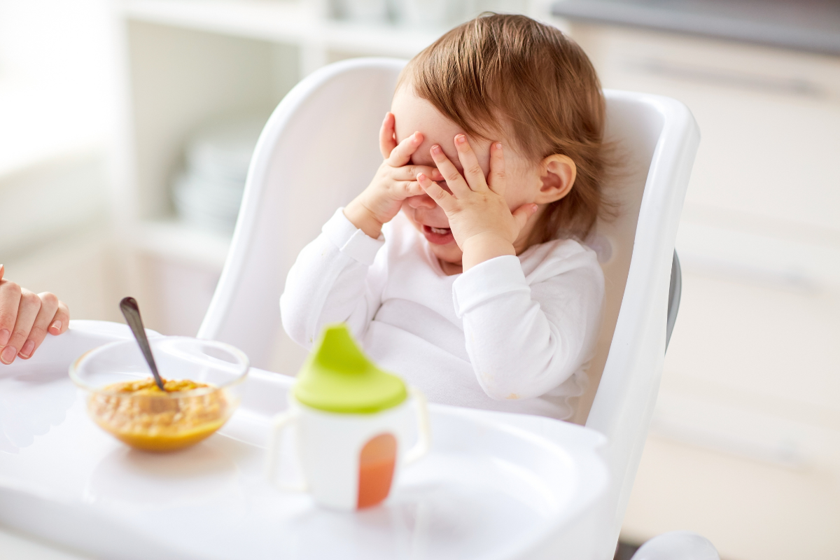 Baby refusing food in high chair